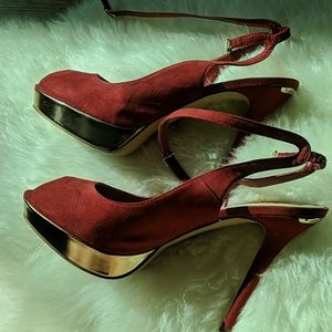 Red sandals with golden edges (slight platform)